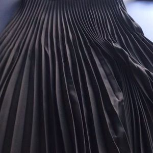 Black pleated Zara skirt with belt.